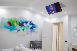 TV in/ali zabaviščno središče v nastanitvi Venere apartement house