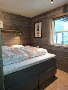 Postel nebo postele na pokoji v ubytování Moderne hytte Vrådal