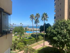 The swimming pool at or close to Playamar Primera linea front beach