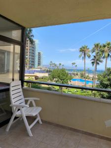 The swimming pool at or close to Playamar Primera linea front beach