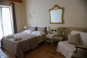 A bed or beds in a room at Villa Carmen
