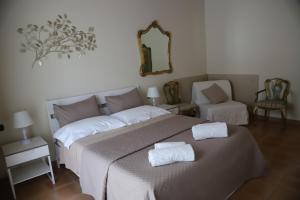A bed or beds in a room at Villa Carmen