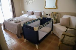 A bed or beds in a room at Villa Carmen
