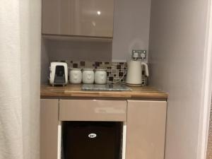 Kuchyň nebo kuchyňský kout v ubytování The Anfield Apartment