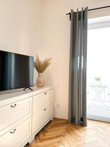 TV a/nebo společenská místnost v ubytování Jen tak spolu - apartmán Znojmo