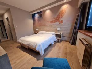 Postel nebo postele na pokoji v ubytování Hotel Alun Nehuen
