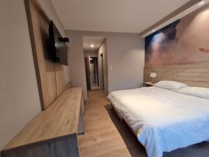 Postel nebo postele na pokoji v ubytování Hotel Alun Nehuen + 20 fotografií