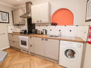 Kuchyň nebo kuchyňský kout v ubytování Simonside Apartment