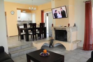 TV a/nebo společenská místnost v ubytování Liza Vacation House
