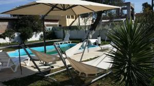 Bazén v ubytování Liza Vacation House nebo v jeho okolí