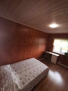 Postel nebo postele na pokoji v ubytování Oruheina Bungalow