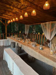 a long table in a pavilion with lights at The View in Iława