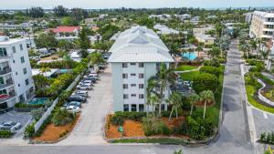 an aerial view of a building in a city at Calini Beach Club in Sarasota