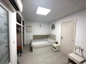 Postel nebo postele na pokoji v ubytování Casa Sergio de Novelda