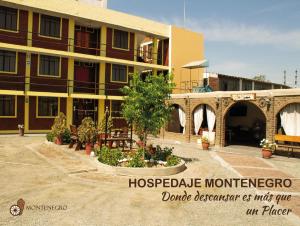 a building with a sign that says hoopedale morguecano restaurant at Hospedaje Montenegro in Ica