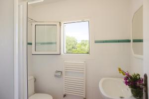 Kúpeľňa v ubytovaní Villa Bahia Dor 15
