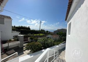 a view from the balcony of a house at Amazing Home in Ponta Garça