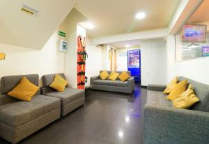 Ein Sitzbereich in der Unterkunft Hotel Bogota Elite