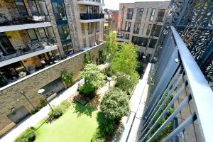 an aerial view of a courtyard with trees and buildings at Bright Amelia Lodge - 2 bed 1 bath with WIFI and Netflix in the heart of London in London