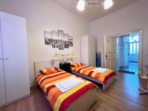 Posteľ alebo postele v izbe v ubytovaní Apartment Platana