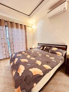 Säng eller sängar i ett rum på Villa Nducha