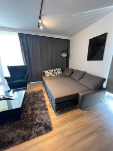 Posezení v ubytování Urban Plaza Business Apartment
