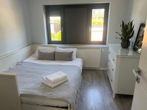 Katil atau katil-katil dalam bilik di Brighton Seaside Retreat