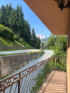a view from a balcony of a road and a bridge at Cabana Mario in Albac +1 photo