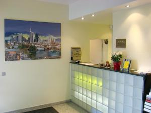 a waiting room with a view of a city at Senator Hotel in Frankfurt/Main
