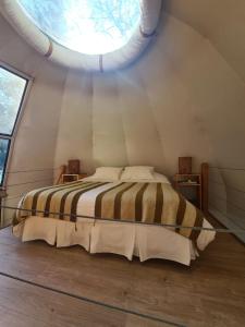 Posteľ alebo postele v izbe v ubytovaní Magma Lodge, Pucon