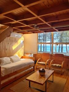 Cama ou camas em um quarto em Magma Lodge, Pucon