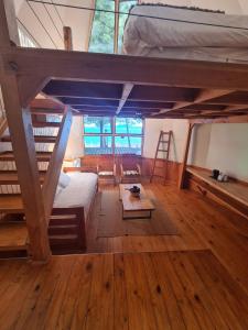 Posteľ alebo postele v izbe v ubytovaní Magma Lodge, Pucon