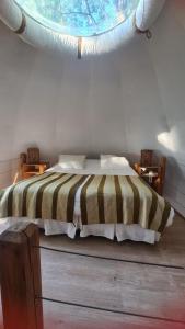 Posteľ alebo postele v izbe v ubytovaní Magma Lodge, Pucon