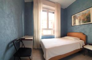Postel nebo postele na pokoji v ubytování Hotel Molise 2