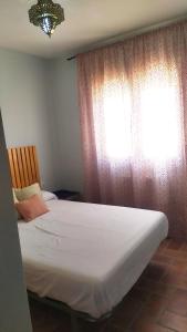 Postel nebo postele na pokoji v ubytování Chorrillo Alto