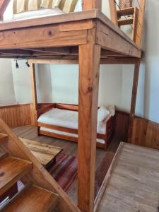 Posteľ alebo postele v izbe v ubytovaní Magma Lodge, Pucon
