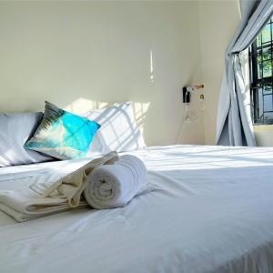 เตียงในห้องที่ Boca Simon Vacation Curacao