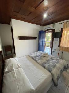 Postel nebo postele na pokoji v ubytování Pousada Brisamar Paraty COMECE O DIA COM UM CAFÉ DA MANHÃ INESQUECÍVEL