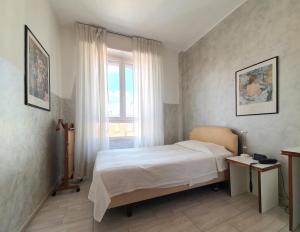 Postel nebo postele na pokoji v ubytování Hotel Molise 2