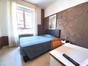 Postel nebo postele na pokoji v ubytování Hotel Molise 2