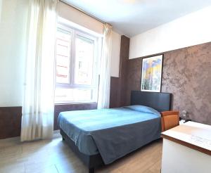 Postel nebo postele na pokoji v ubytování Hotel Molise 2