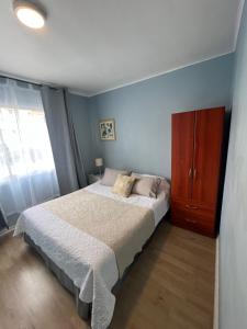 Cama ou camas em um quarto em Hostal Ravello
