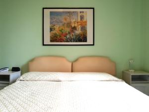 Postel nebo postele na pokoji v ubytování Hotel Molise 2