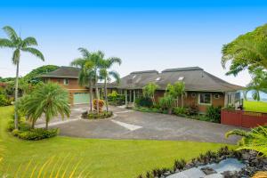 a house with palm trees in front of it at ENC-183 - SeaBluffe Escape in Encinitas