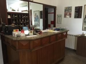 Kuchyň nebo kuchyňský kout v ubytování Hotel Vittoria