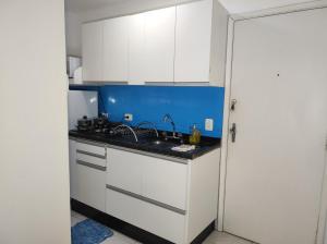 Kuchyň nebo kuchyňský kout v ubytování Apartamento Master no centro de Curitiba + 78 fotografií