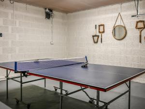 a ping pong table in a room at The Cherry Tree in Thorney