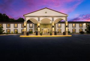 a rendering of a hotel with a large building at Red Roof Inn Dahlgren - Naval Base in Dahlgren