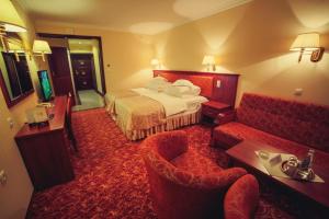 Posteľ alebo postele v izbe v ubytovaní Hotel Gołębiewski Mikołajki