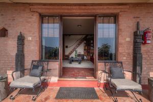 Area soggiorno di Shivapuri Heights Cottage